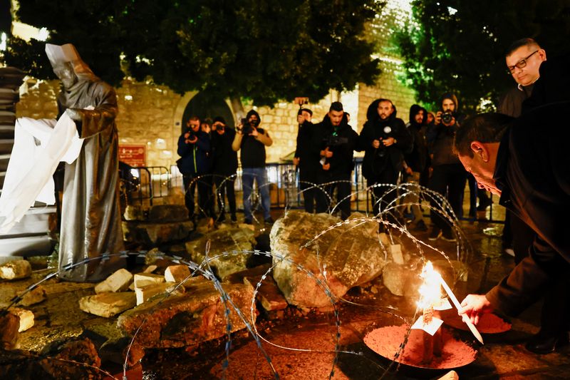 Sombre Bethlehem marks Christmas with vigil as bombs rain on Gaza