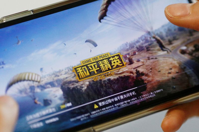 &copy; Reuters. 　中国の中小のゲーム会社が相次ぎ自社株買いを発表している。写真はテンセントのゲーム「ゲーム・フォー・ピース（和平精英）」。２０１９年５月撮影（２０２３年　ロイター／Florence 