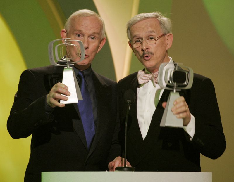 &copy; Reuters. FILE PHOTO: Comedians and brothers, Tom (L) and Dick Smothers, star of the television series "The Smothers Brothers Comedy Show" accept the Favorite Singing Siblings award at the 3rd annual TV Land Awards in Santa Monica, California March 13, 2005. The aw