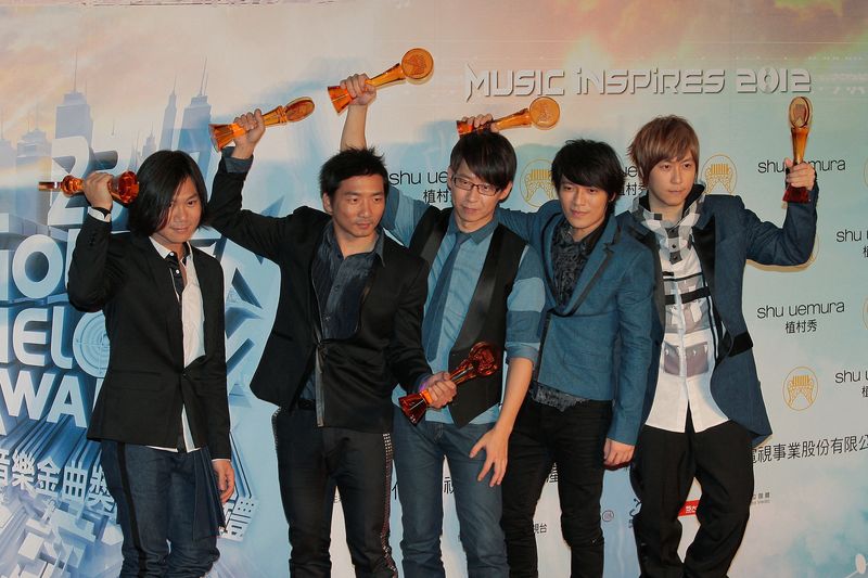 &copy; Reuters. FILE PHOTO: Taiwan pop band Mayday pose after winning the Best Song of The Year, the Best Album Composer, the Best Arranger, the Best Composer, the Best Mandarin Album of the Year and the Best Musical group categories at the 23rd Golden Melody Awards in T