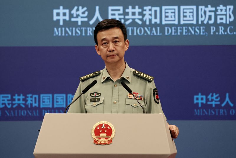 &copy; Reuters. FILE PHOTO: Chinese Defence Ministry spokesperson Wu Qian attends a press briefing in Beijing, China August 31, 2023. REUTERS/Shubing Wang