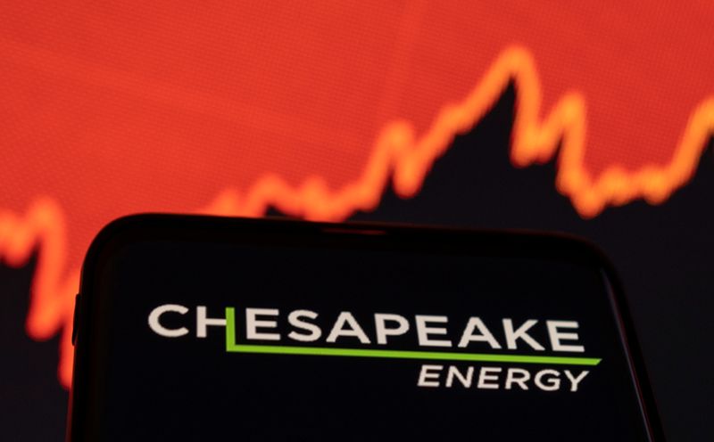 &copy; Reuters. Chesapeake Energy logo is seen on smartphone in front of displayed stock graph in this illustration taken January 25, 2022. REUTERS/Dado Ruvic/Illustration/File Photo