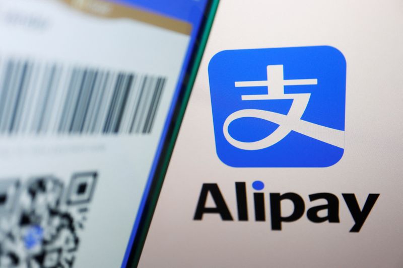 &copy; Reuters. The Alipay logo is displayed next to a QR payment code on the app, in this illustration picture taken June 28, 2023. REUTERS/Florence Lo/Illustration/File Photo