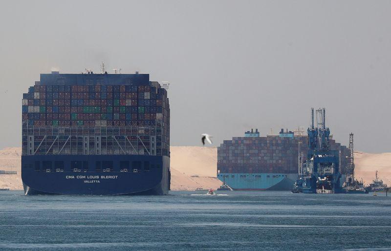 &copy; Reuters. FILE PHOTO: CMA CGM Louis Bleriot and a Maersk Line container ship pass through the Suez Canal in Ismailia, Egypt July 7, 2021. Picture taken July 7, 2021. REUTERS/Amr Abdallah Dalsh