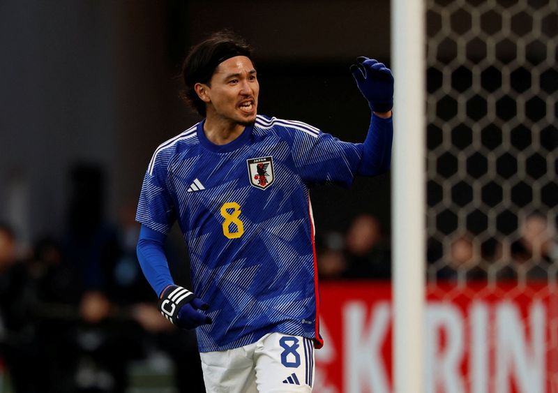 &copy; Reuters. 　サッカー日本代表は１日、東京・国立競技場でタイ代表と国際親善試合を行い、後半にゴールを重ねて５─０で快勝した。写真は日本代表の南野拓実（２０２４年　ロイター/Issei Kato）