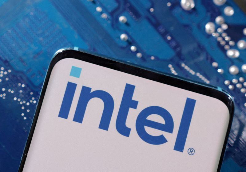 &copy; Reuters. FILE PHOTO: A smartphone with a displayed Intel logo is placed on a computer motherboard in this illustration taken March 6, 2023. REUTERS/Dado Ruvic/Illustration/File Photo