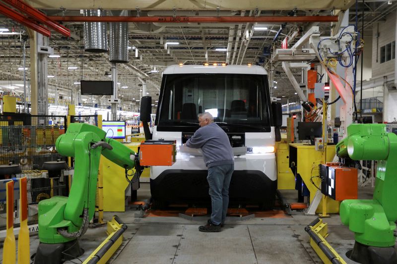 &copy; Reuters. FILE PHOTO: An employee works on the line at automaker General Motors (GM) Brightdrop unit's CAMI EV Assembly, Canada's first full-scale electric vehicle manufacturing plant, in Ingersoll, Ontario, Canada December 5, 2022.  REUTERS/Carlos Osorio/File Phot