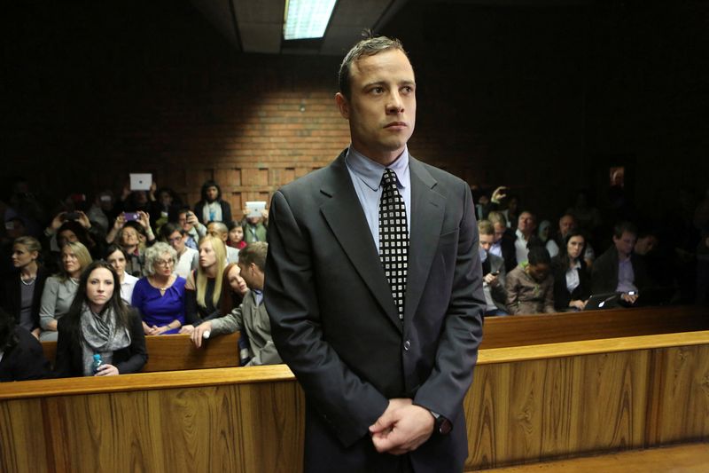 &copy; Reuters. FILE PHOTO: Oscar Pistorius enters the dock before court proceedings at the Pretoria Magistrates court June 4, 2013. REUTERS/Siphiwe Sibeko/File Photo