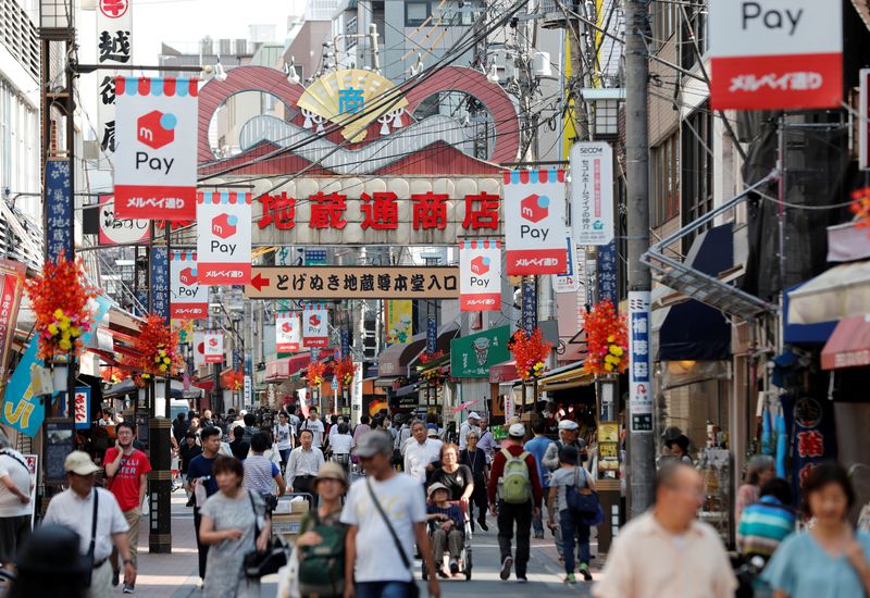 &copy; Reuters. FILE PHOTO: A shopping district is pictured in Tokyo, Japan October 1, 2019. REUTERS/Kim Kyung-Hoon/File Photo