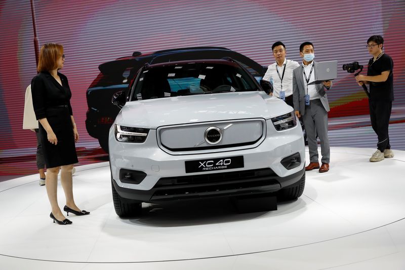 &copy; Reuters. People look at a Volvo XC40 car during the Beijing International Automotive Exhibition, or Auto China show, in Beijing, China September 26, 2020. REUTERS/Thomas Peter/file photo