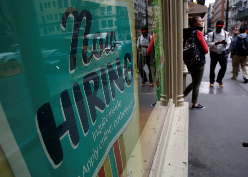 &copy; Reuters. FILE PHOTO: A "Now Hiring" sign is posted on a restaurant in Manhattan in New York City, U.S., May 10, 2016.  REUTERS/Brendan McDermid/File Photo