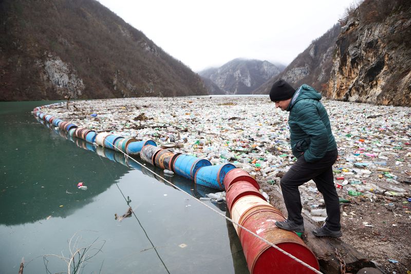 Bosnian river's floating waste dump threatens health, tourism