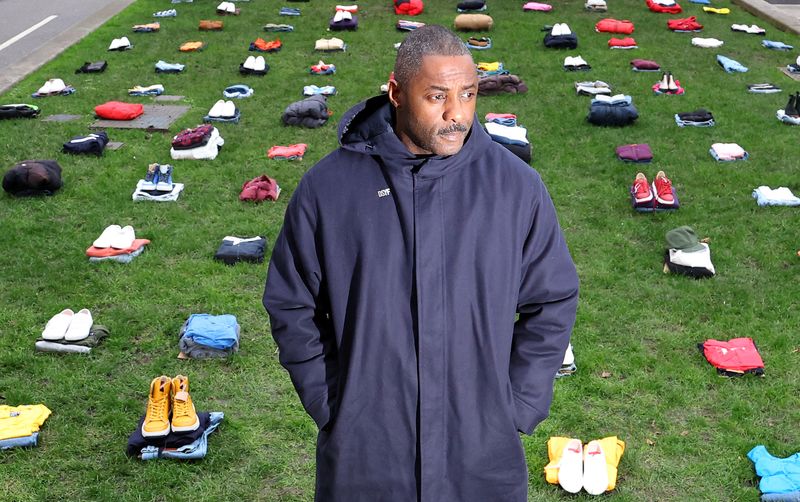 &copy; Reuters. British actor Idris Elba stands in front of a display of clothing representing individual victims as he highlights an anti-knife crime campaign, near the Houses of Parliament in London, Britain, January 8, 2024. REUTERS/Toby Melville   