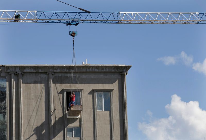 &copy; Reuters. A construction worker is pictured in downtown Ulaanbaatar, Mongolia, June 30, 2016. REUTERS/Jason Lee/File Photo