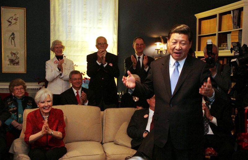 &copy; Reuters. FILE PHOTO: China's Vice President Xi Jinping speaks at the home of Roger and Sarah Lande (2nd L) in Muscatine, Iowa February 15, 2012. Xi joked about receiving a gift of popcorn during his first visit to Muscatine in 1985.  REUTERS/Kevin E. Schmidt/Pool 