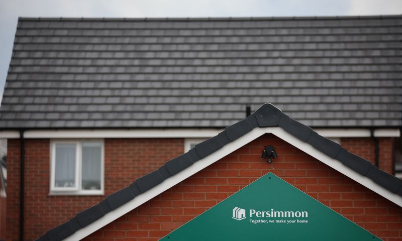 &copy; Reuters. A company logo is seen on the outside of a sales office at a Persimmon housing development in Liverpool, Britain, August 23, 2023. REUTERS/Phil Noble/File Photo
