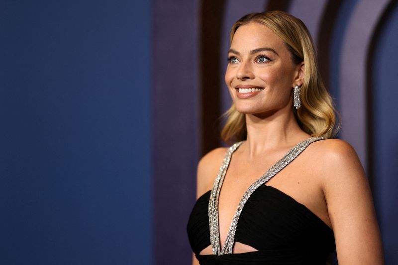 © Reuters. FILE PHOTO: Actor Margot Robbie attends the 14th Governors Awards in Los Angeles, California, U.S., January 9, 2024. REUTERS/Mario Anzuoni
