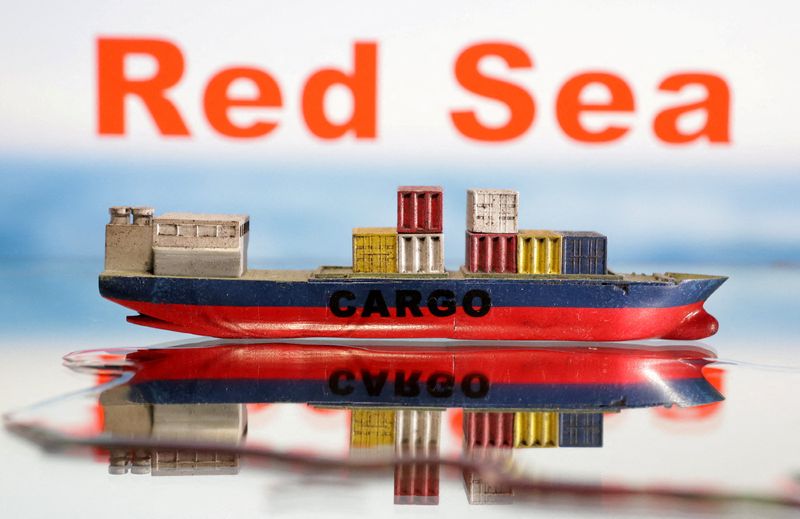 &copy; Reuters. نموذج سفينة شحن فوقها البحر الأحمر مكتوبة بالإنجليزية في صورة توضيحية التقطت في التاسع من يناير كانون الثاني 2024. تصوير: دادو روفيتش - رويترز.