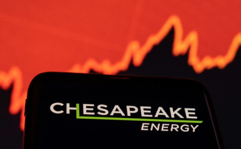 &copy; Reuters. FILE PHOTO: Chesapeake Energy logo is seen on smartphone in front of displayed stock graph in this illustration taken January 25, 2022. REUTERS/Dado Ruvic/Illustration/File Photo