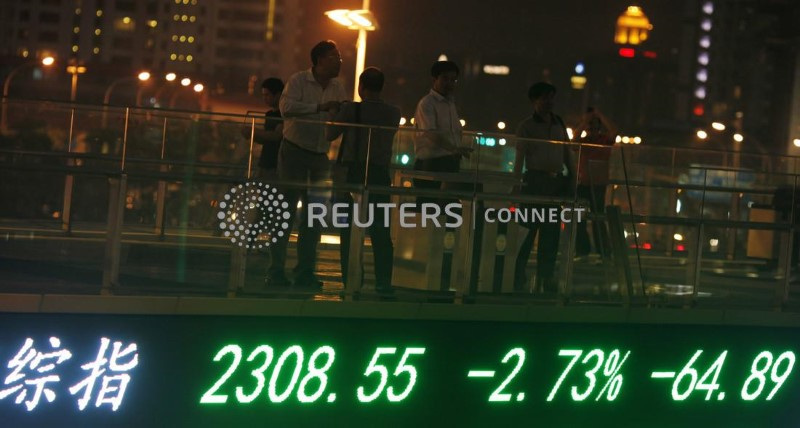 &copy; Reuters. Telão mostra cotações do mercado acionário em Xangai
04/06/2012. REUTERS/Carlos Barria