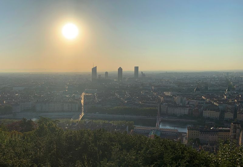 &copy; Reuters. FILE PHOTO: A general view shows the city of Lyon after sunrise from the Fourviere esplanade as France issued a "red alert" for four southern regions amid a spell of excessively hot weather, especially in the Rhone valley, France, August 22, 2023. REUTERS