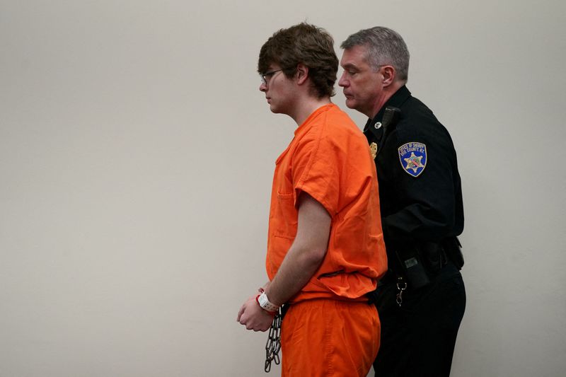 &copy; Reuters. FILE PHOTO: Tops gunman Payton Gendron is escorted out of the courtroom after he was sentenced to life in prison without parole for domestic terrorism motivated by hate and each of the 10 counts of first-degree murder by Erie County Court Judge Susan Eaga