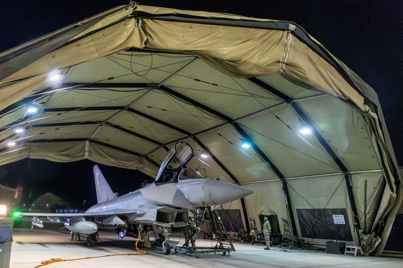 © Reuters. RAF Typhoon aircraft is pictured at RAF Akrotiri following its return after striking military targets in Yemen during the U.S.-led coalition operation, aimed at the Iran-backed Houthi militia that has been targeting international shipping in the Red Sea, in Cyprus, in this handout picture released on January 12, 2024.   Sgt Lee Goddard/UK MOD/Handout via REUTERS  