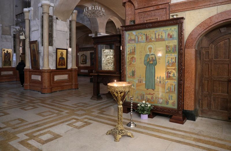 &copy; Reuters. FILE PHOTO: A view shows an icon, an element of which depicts Soviet leader Joseph Stalin being blessed by Russian Orthodox saint Matrona of Moscow, and that was recently defaced with paint in an act of protest amid controversy over the icon’s apparent 