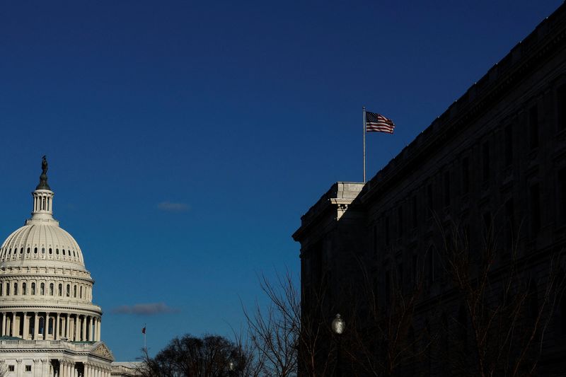 &copy; Reuters. The U.S. flag flies over the Cannon House Office Building on Capitol Hill, where later today the U.S. House Select Committee to Investigate the January 6 Attack on the United States Capitol will hold their final public meeting in Washington, U.S. December