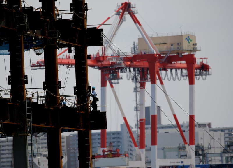 &copy; Reuters. A man works in a construction site at an industrial port in Tokyo, Japan, May 22, 2019. Picture taken on May 22, 2019.  REUTERS/Kim Kyung-Hoon/File Photo
