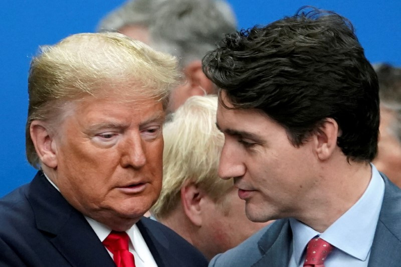 &copy; Reuters.  １月１６日、  カナダのトルドー首相は、１１月の米大統領選で共和党のトランプ前大統領が勝利すれば「一歩後退」で、カナダにとって厳しい状況になるとの見方を示した。写真は２０１