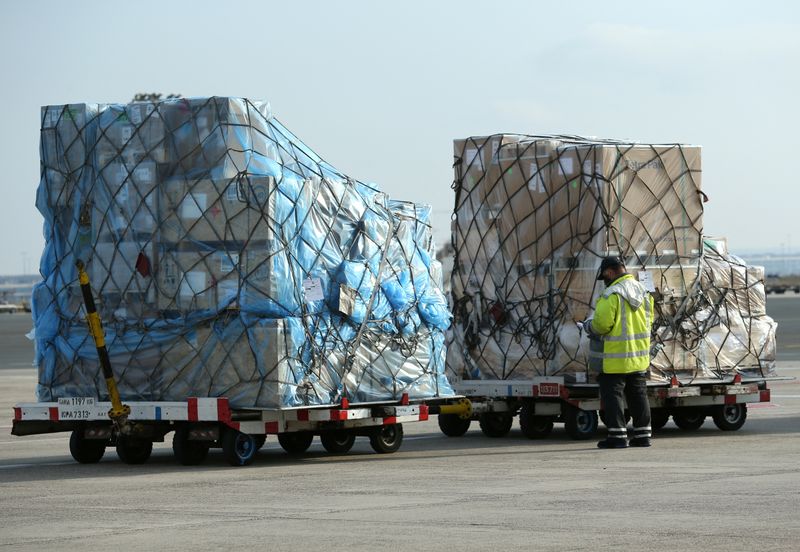 &copy; Reuters. FILE PHOTO: An employee checks freight at a ramp of Frankfurt airport, Germany, November 27, 2020.   REUTERS/Ralph Orlowski/File Photo