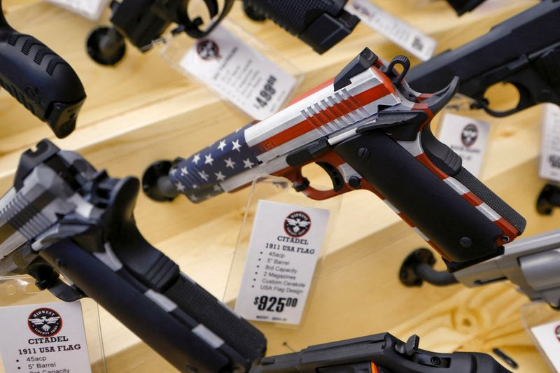 &copy; Reuters. FILE PHOTO: A U.S. flag-themed handgun is displayed for sale at the Des Moines Fairgrounds Gun Show at the Iowa State Fairgrounds in Des Moines, Iowa, U.S. March 11, 2023. REUTERS/Jonathan Ernst/File Photo