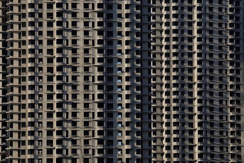 &copy; Reuters. FILE PHOTO: Unfinished buildings are seen at the New Zone urban development in Dandong, Liaoning province, China, November 19, 2017. REUTERS/Damir Sagolj/File Photo
