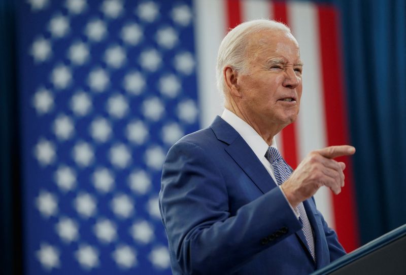 Biden signs into law stopgap bill averting US government shutdown