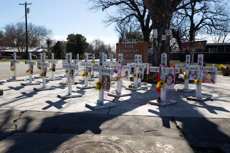 &copy; Reuters. Memorial crosses stand in front of Robb Elementary School, as U.S. Attorney General Merrick Garland announces the results of a review into the law enforcement response to a 2022 mass shooting in Uvalde, Texas, U.S., January 18, 2024. REUTERS/Kaylee Greenl