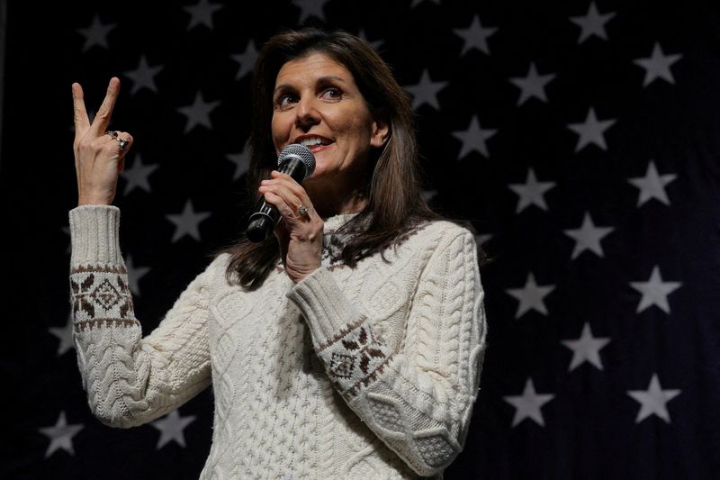 &copy; Reuters. Republican presidential candidate and former U.S. Ambassador to the United Nations Nikki Haley gestures, indicating a two-person race after opponent Florida Governor Ron DeSantis suspended his campaign, during a Get Out the Vote campaign rally ahead of th