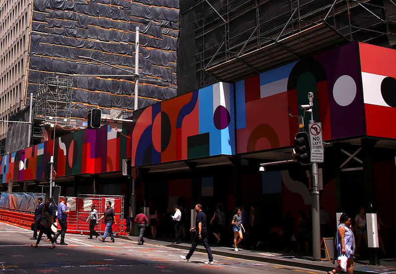 &copy; Reuters. Buildings being renovated and under construction can be seen near shoppers as they walk along a street in the central business district (CBD) of Sydney in Australia, February 13, 2018.   REUTERS/David Gray/File Photo