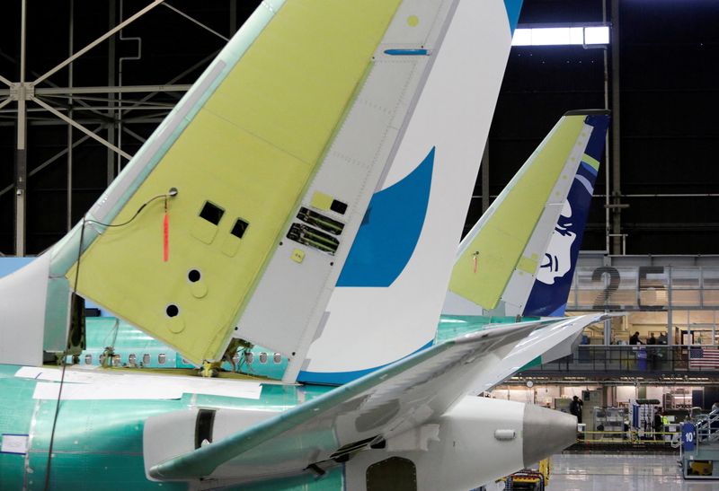 &copy; Reuters. FILE PHOTO: The tail of Boeing's new 737 MAX-9 (L) is pictured next to an older model under construction at their production facility in Renton, Washington, U.S., February 13, 2017. Picture taken February 13, 2017. REUTERS/Jason Redmond/File Photo