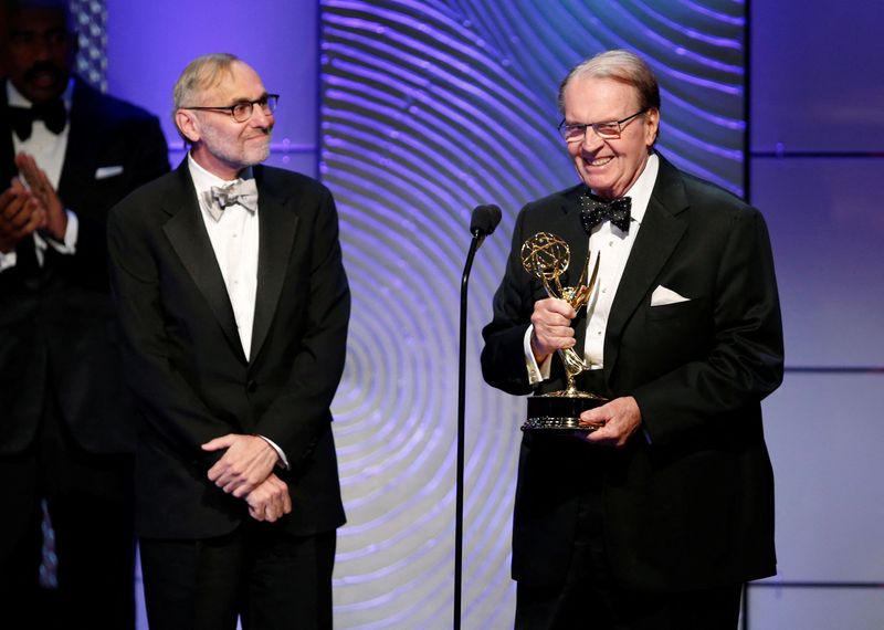 © Reuters. FILE PHOTO: Executive producer Rand Morrison (L) and anchor Charles Osgood of 