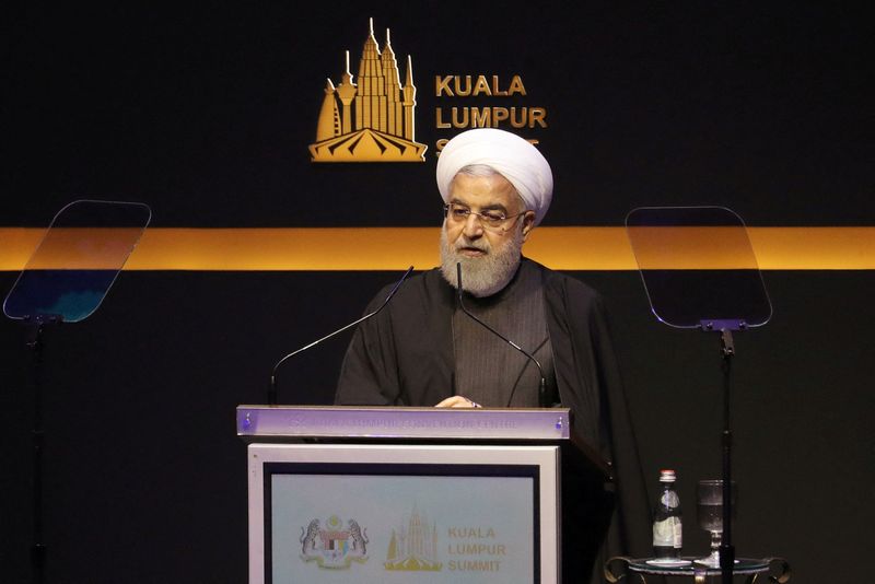 &copy; Reuters. الرئيس الإيراني السابق حسن روحاني يتحدث في كوالالمبور بصورة من أرشيف رويترز.