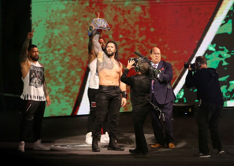 &copy; Reuters. FILE PHOTO: Wrestling - WWE Crown Jewel 2021 - Mohammed Abdu Arena, Riyadh, Saudi Arabia - October 21, 2021 Roman Reigns holding up his belt REUTERS/Ahmed Yosri/File Photo