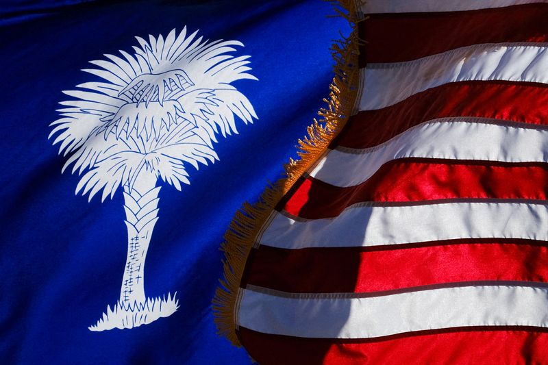 &copy; Reuters. FILE PHOTO: The South Carolina State flag and the American Flag wave during the state's oldest Martin Luther King Day Parade in York, South Carolina, U.S., January 13, 2024. REUTERS/Kevin Wurm