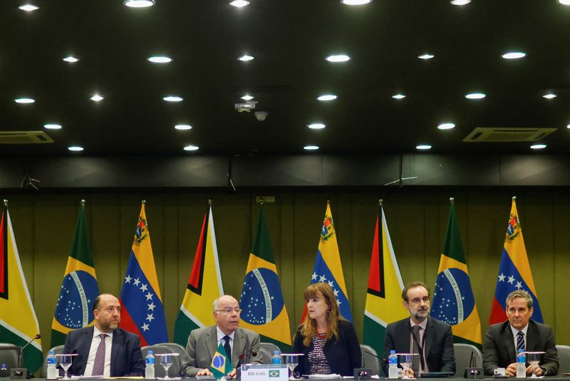 &copy; Reuters. Brazil's Foreign Minister Mauro Vieira, Venezuela's Foreign Minister Yvan Gil and Guyana's Foreign Minister Hugh Todd attend a meeting between representatives of the governments of Venezuela and Guyana to discuss the crisis surrounding the territory of Es