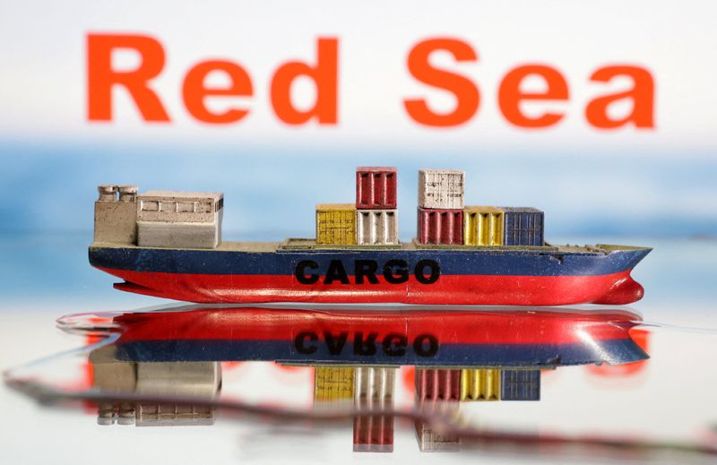 &copy; Reuters. نموذج لسفينة بضائع وفي الخلفية كلمتا البحر الأحمر بالإنجليزية في صورة توضيحية التقطت في التاسع من يناير كانون الثاني 2024 . تصوير : دادو روفيت