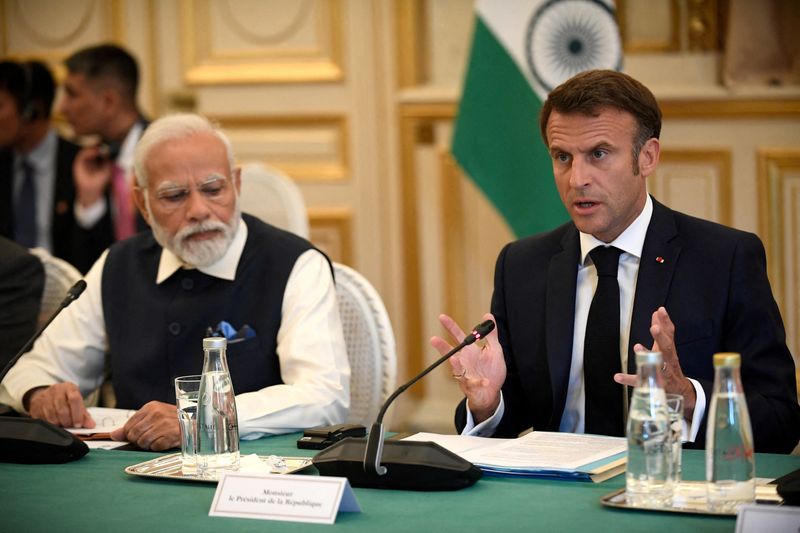 &copy; Reuters. FILE PHOTO: France's President Emmanuel Macron speaks as India's Prime Minister Narendra Modi listens during a meeting at The Ministry of Foreign Affairs in Paris, France on July 14, 2023.     JULIEN DE ROSA/Pool via REUTERS/File Photo