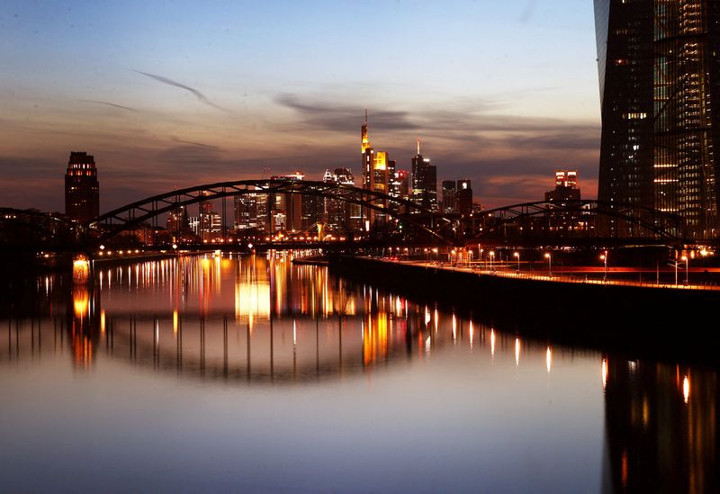 &copy; Reuters. FILE PHOTO: The city's skyline with its banking towers is photographed during sunset, as the spread of the coronavirus disease (COVID-19) continues, in Frankfurt, Germany, April 8, 2021.  REUTERS/Kai Pfaffenbach/File Photo