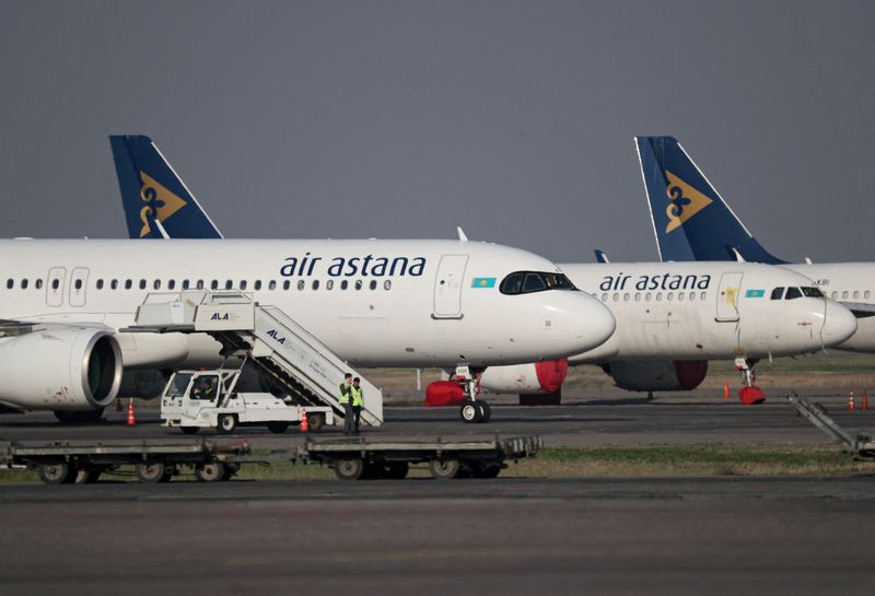 &copy; Reuters. FILE PHOTO: A view shows Air Astana planes parked at Almaty International Airport, in Almaty, Kazakhstan March 28, 2023. REUTERS/Pavel Mikheyev/File Photo