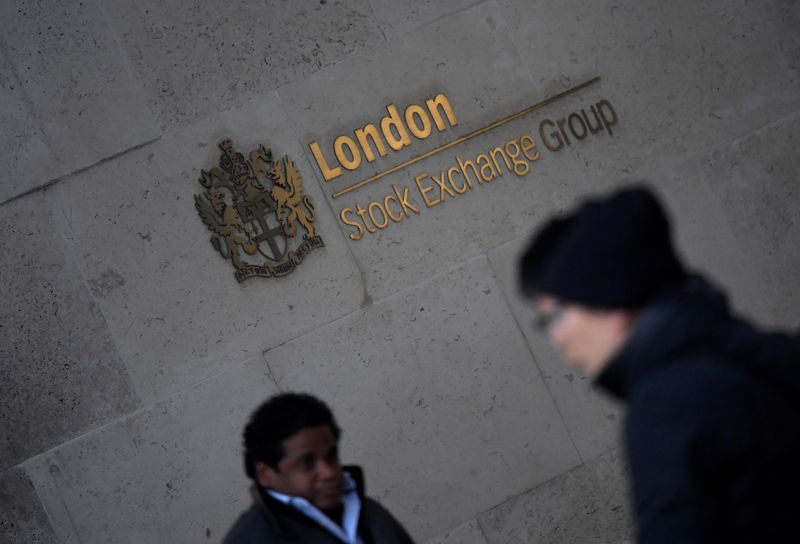 &copy; Reuters. People walk past the London Stock Exchange Group offices in the City of London, Britain, December 29, 2017. REUTERS/Toby Melville