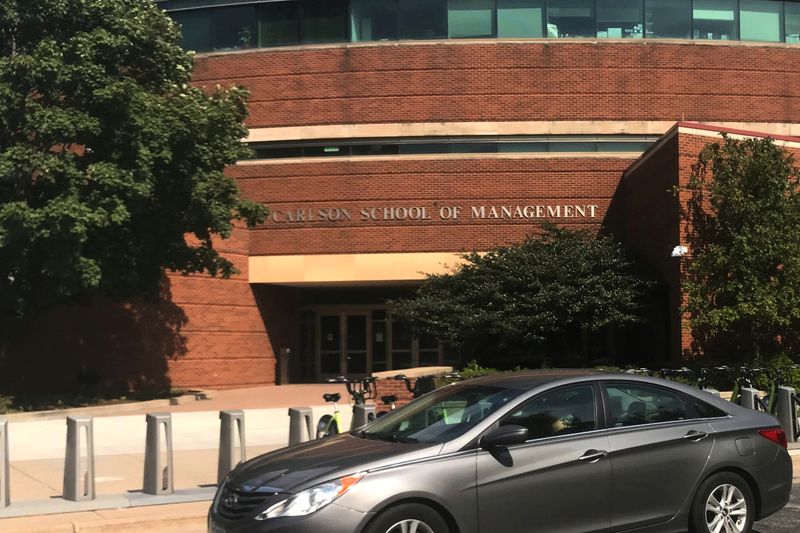 &copy; Reuters. FILE PHOTO: A car drives past the Carlson School of Management at the University of Minnesota  in Minneapolis, Minnesota, U.S., September 19, 2018.  Photo taken September 19, 2018.  REUTERS/Koh Gui Qing/File Photo